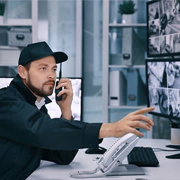 Security man working with industrial touch screen panel